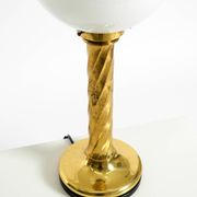 Large 1960s brass column-style table lamp with frosted glass globe