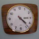 Formica wall clock with day and date - 1970s