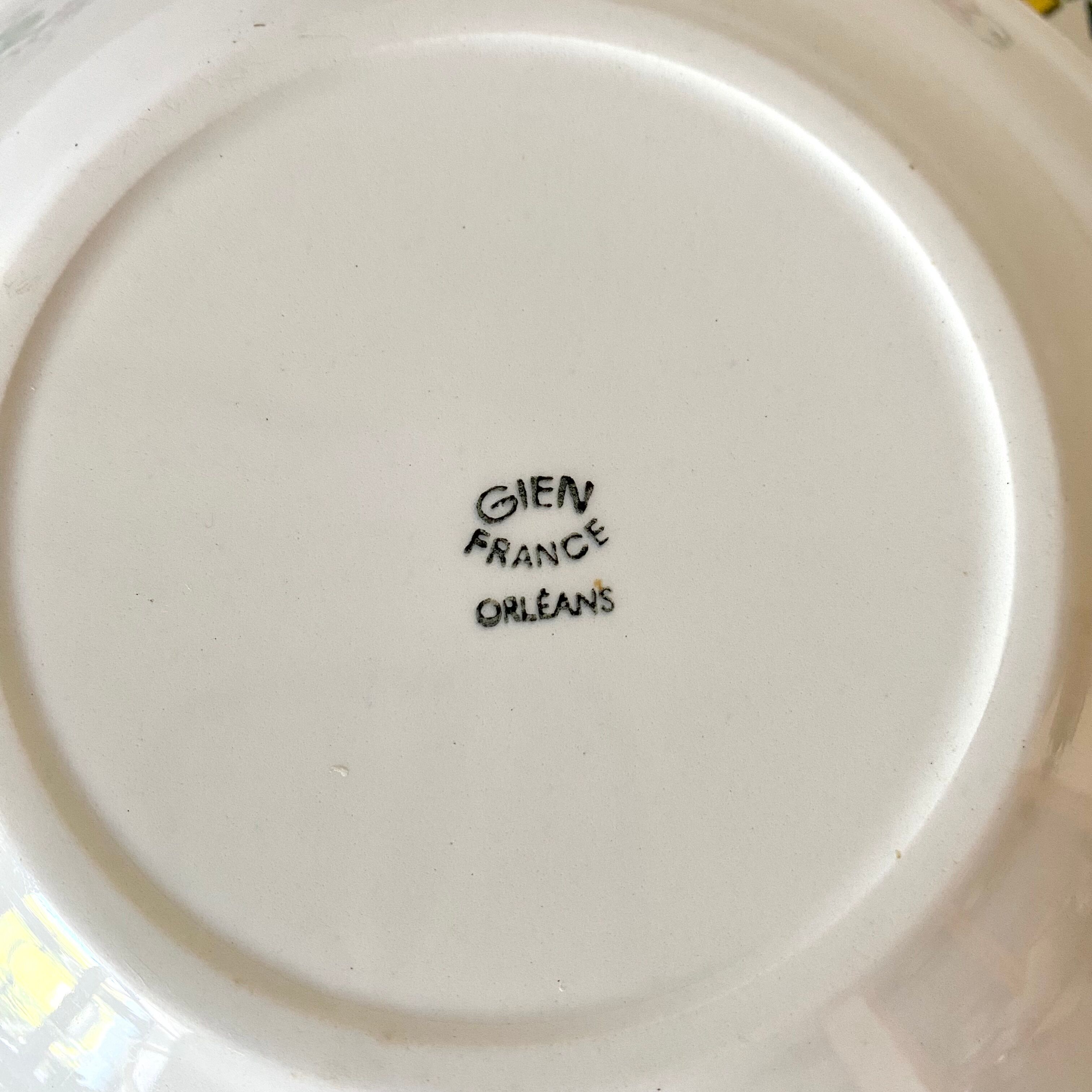 Hollow earthenware plates from Gien