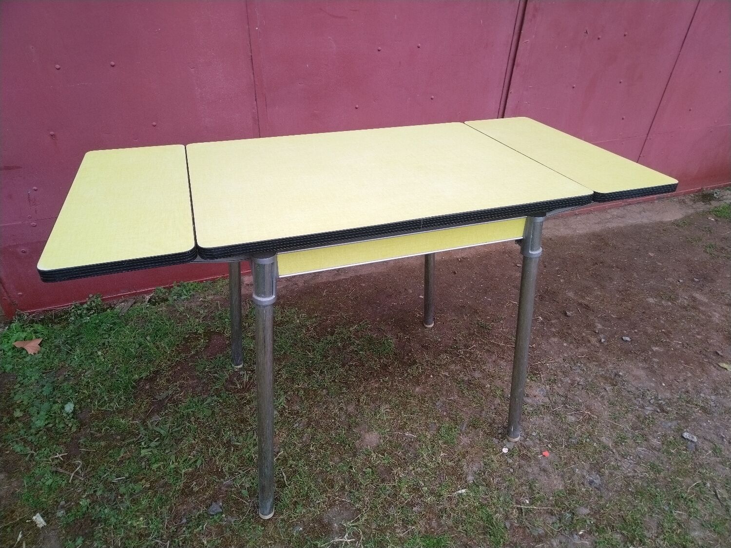 Yellow formica table with extensions