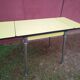 Yellow formica table with extensions