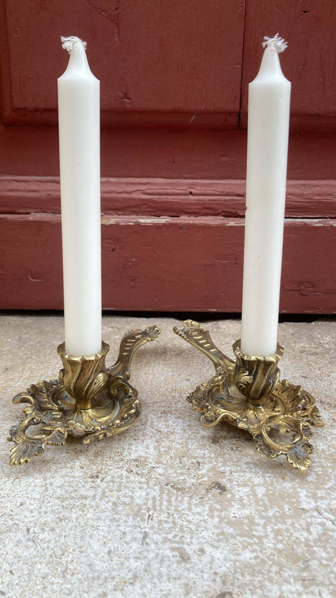 Pair of hand candlesticks / bronze candle holders
