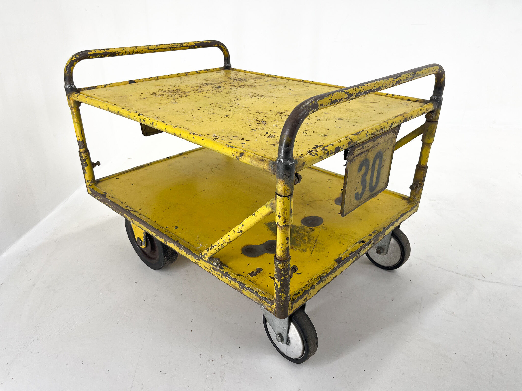 Vintage industrial coffee or side table on wheels