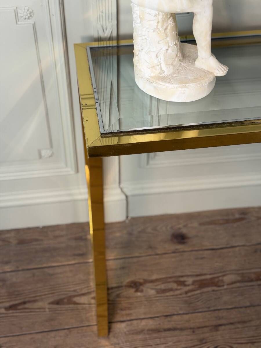 Golden and chrome metal console, bevelled glass, circa 1980.