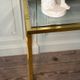 Golden and chrome metal console, bevelled glass, circa 1980.