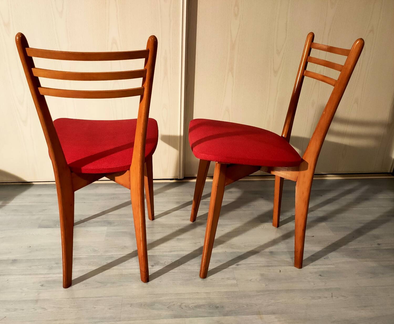Pair of vintage wooden and leatherette chairs