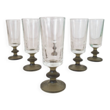 6 small green foot flutes in the Timo Sarpaneva style