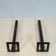Pair of modernist andirons in steel and wrought iron