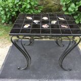 Vintage ceramic coffee table by Guy Trévoux with wrought iron base.