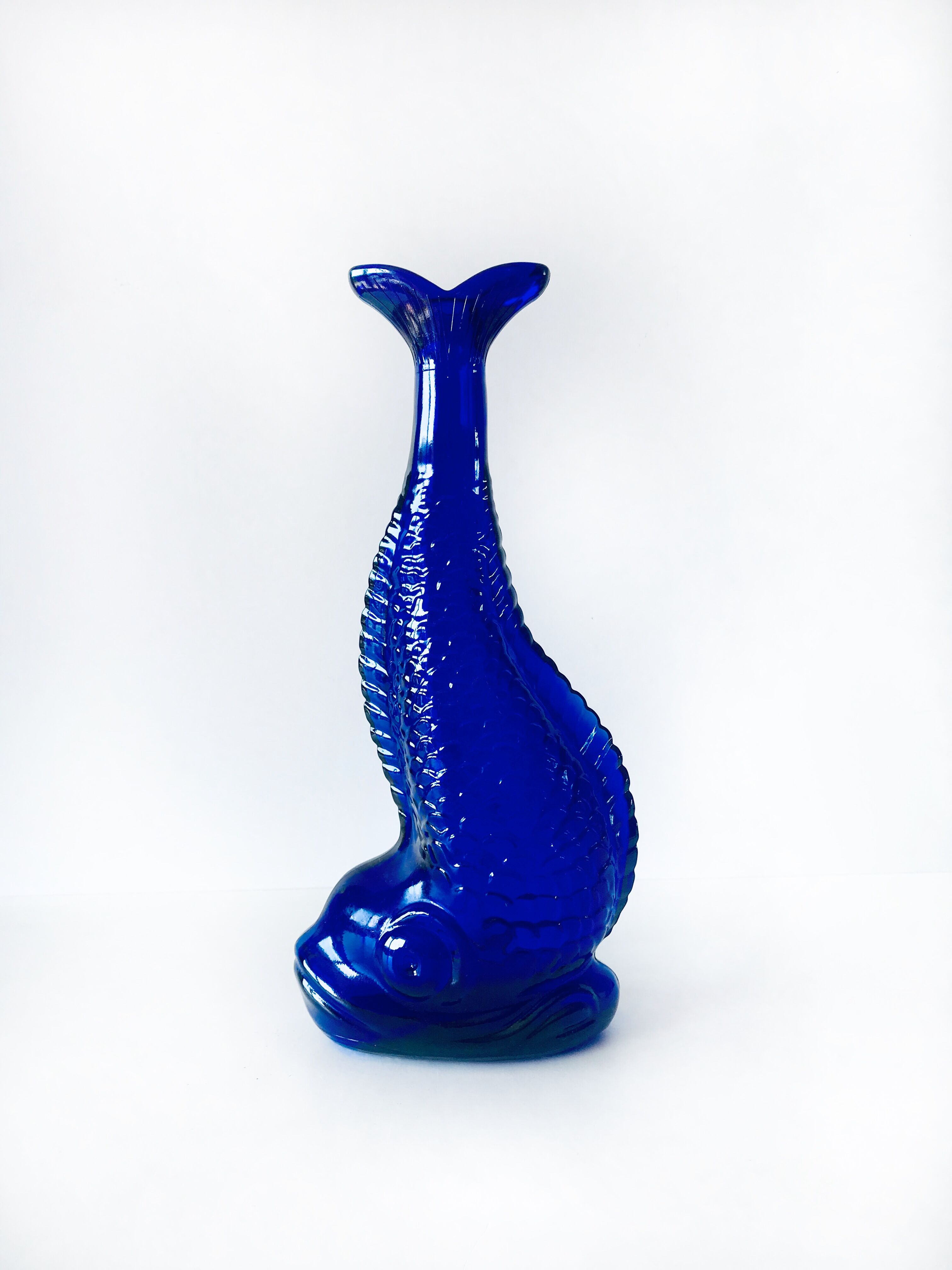 Blue glass fish vase