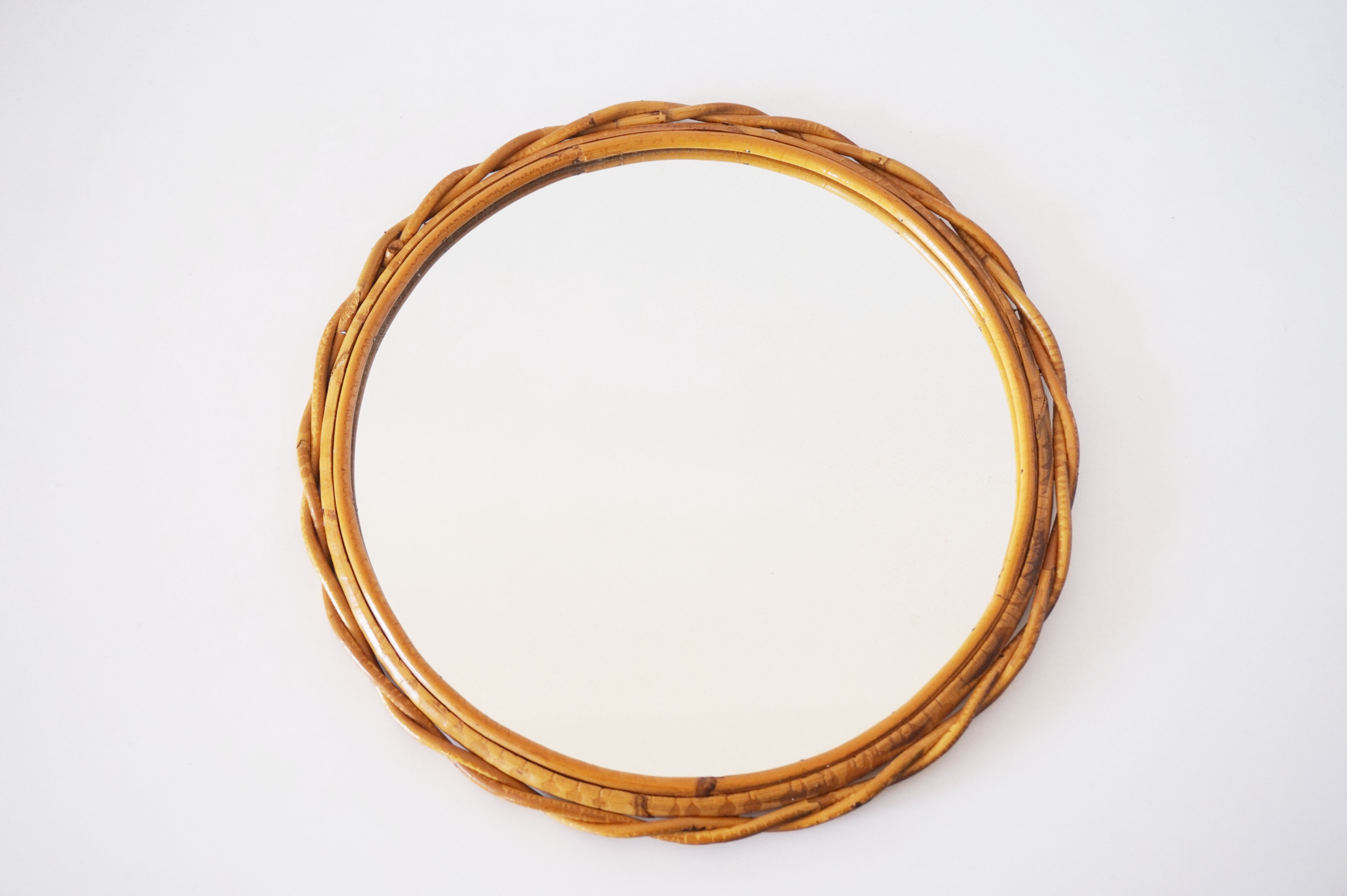 Vintage rattan sun mirror