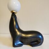Lampe otarie noire irisée bleue en terre cuite