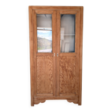 Old glass-fronted wooden library – blue interior