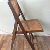 Folding chair caned from the 70s