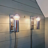 Pair of tubular wall sconces in chrome metal, 1970.