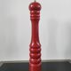 Giant vintage red lacquered wooden pepper mill