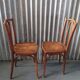 Pair of curved wooden bistro chairs