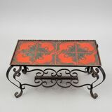 Vintage coffee table in glazed ceramic and wrought iron.