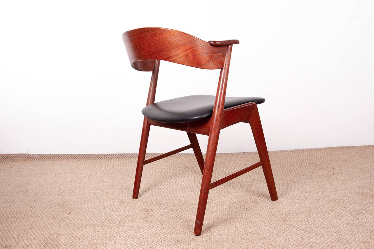Danish armchair in teak and Skai, by Henning Kjaernulf for Korup Stolefabr.