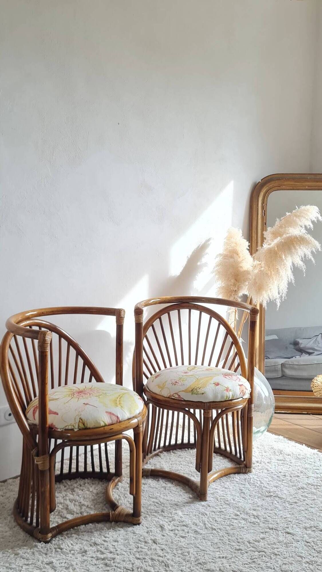 Pair of vintage rattan armchairs circa the 1960s.
