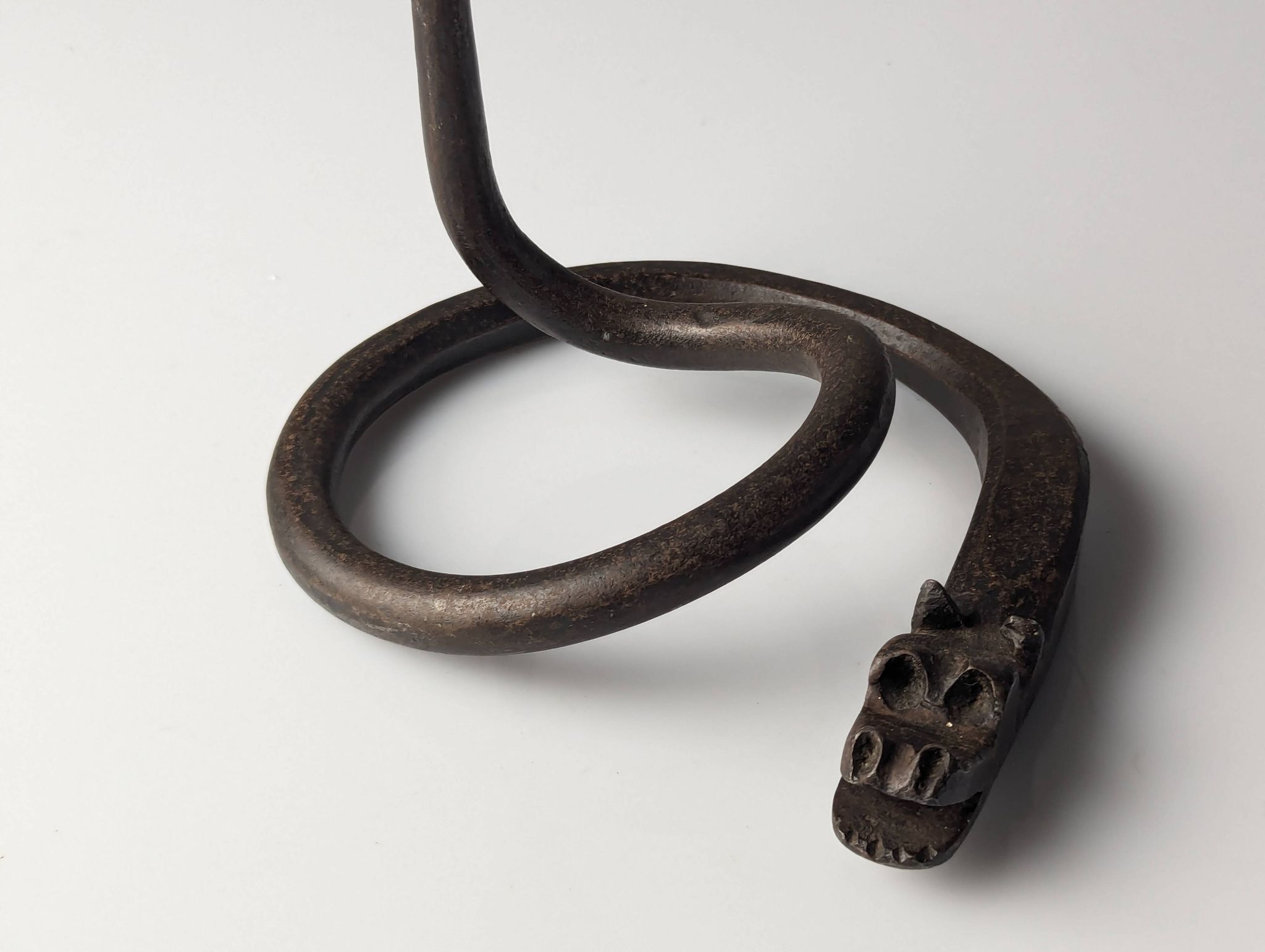 Wrought iron candelabra with dragon head, Samuel Yellin style, 20th century
