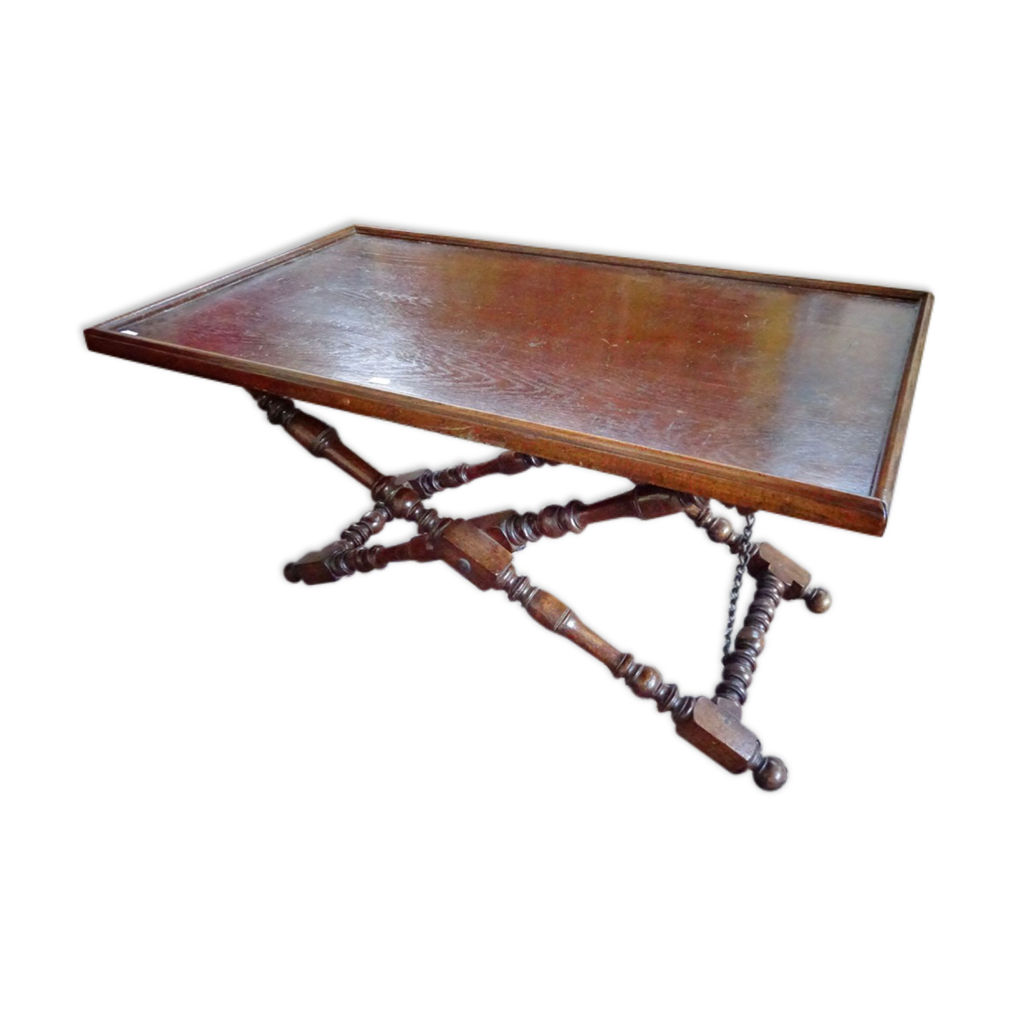 Foldable coffee table in solid oak and turned legs