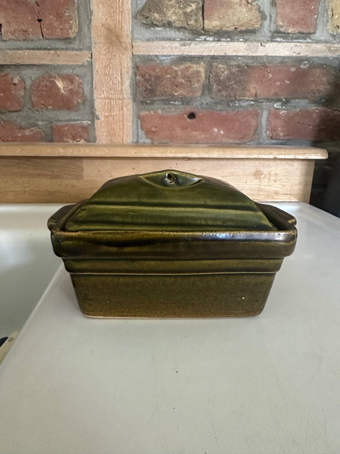 Vintage green majolica butter dish