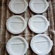 12 flat plates in earthenware/fish