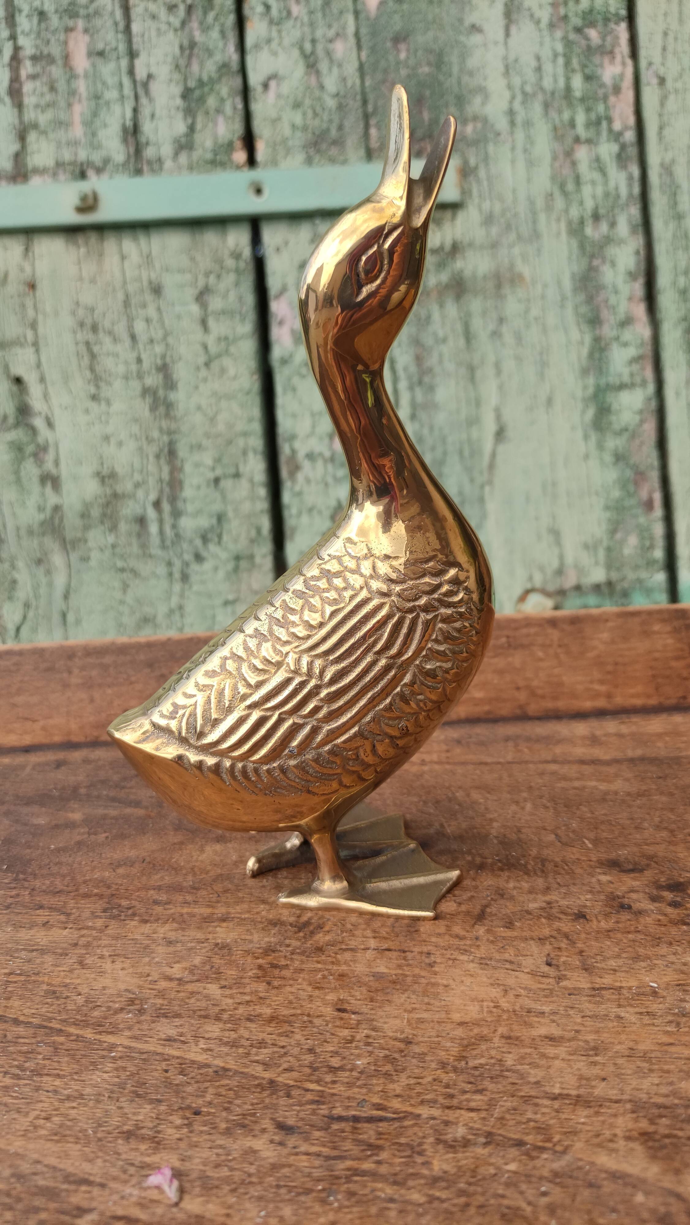 Large vintage duck in golden brass