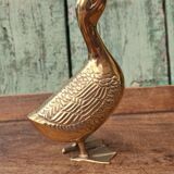 Large vintage duck in golden brass