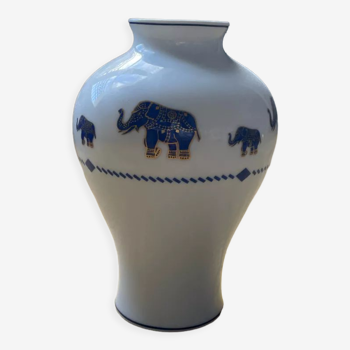 White crillon vase with blue elephants
