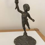 Pair of Cherub candlesticks.