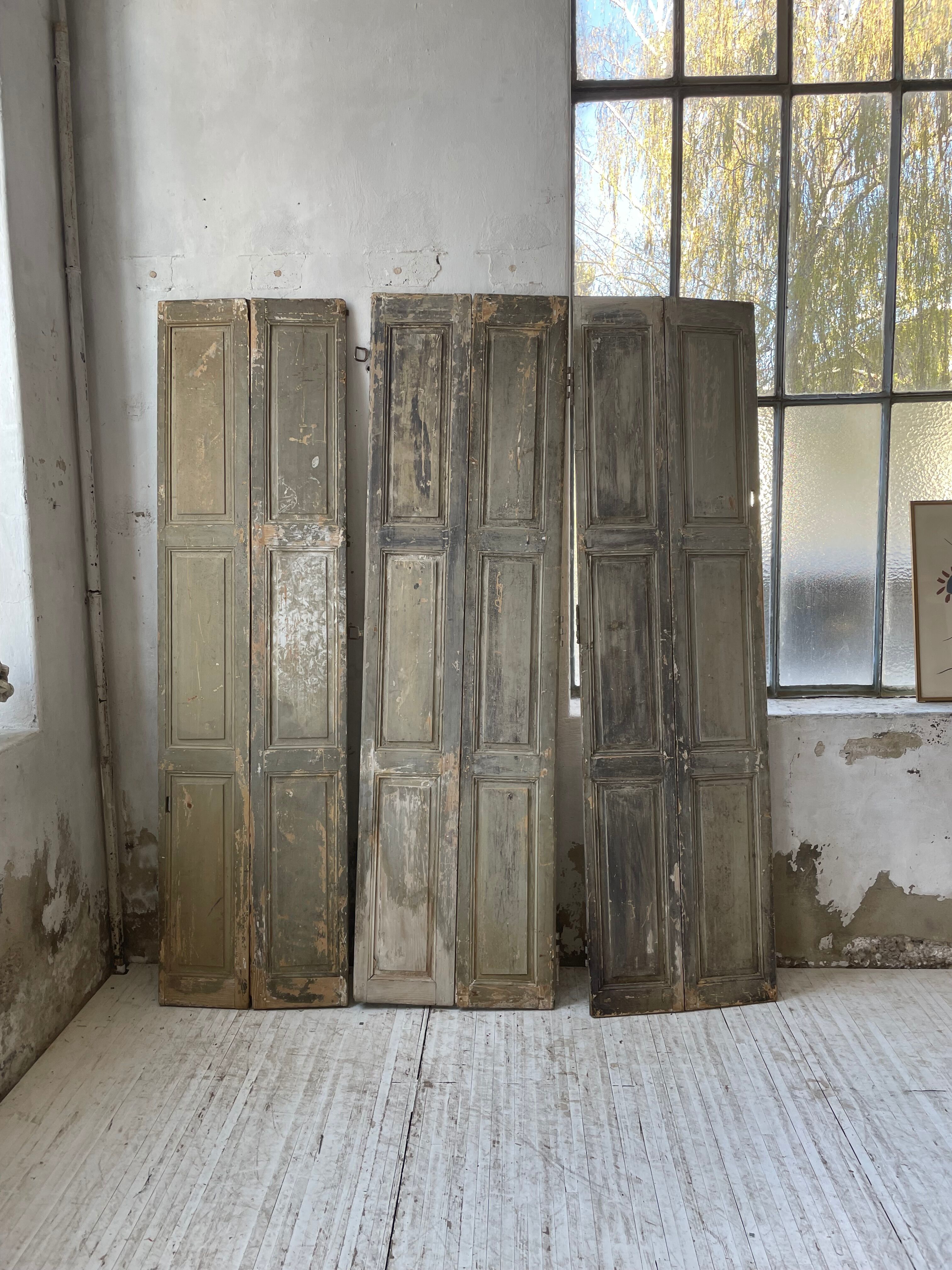 Trio of shutters louvers patina blue gray