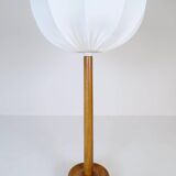 Mid-century solid teak table lamp from the 1960s Sweden.
