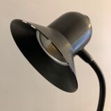 Articulated and adjustable black metal lamp