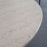 Round coffee table in travertine