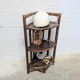 Rattan corner shelf