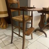 Antique straw-covered high chair