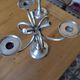 Ercuis pair of candlesticks model Cheverny in silver-plated metal with hunting horn decoration.