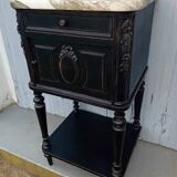 Romantic black bedside table with patinated marble and wood
