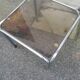 Table basse vintage chrome et verre fumé marron