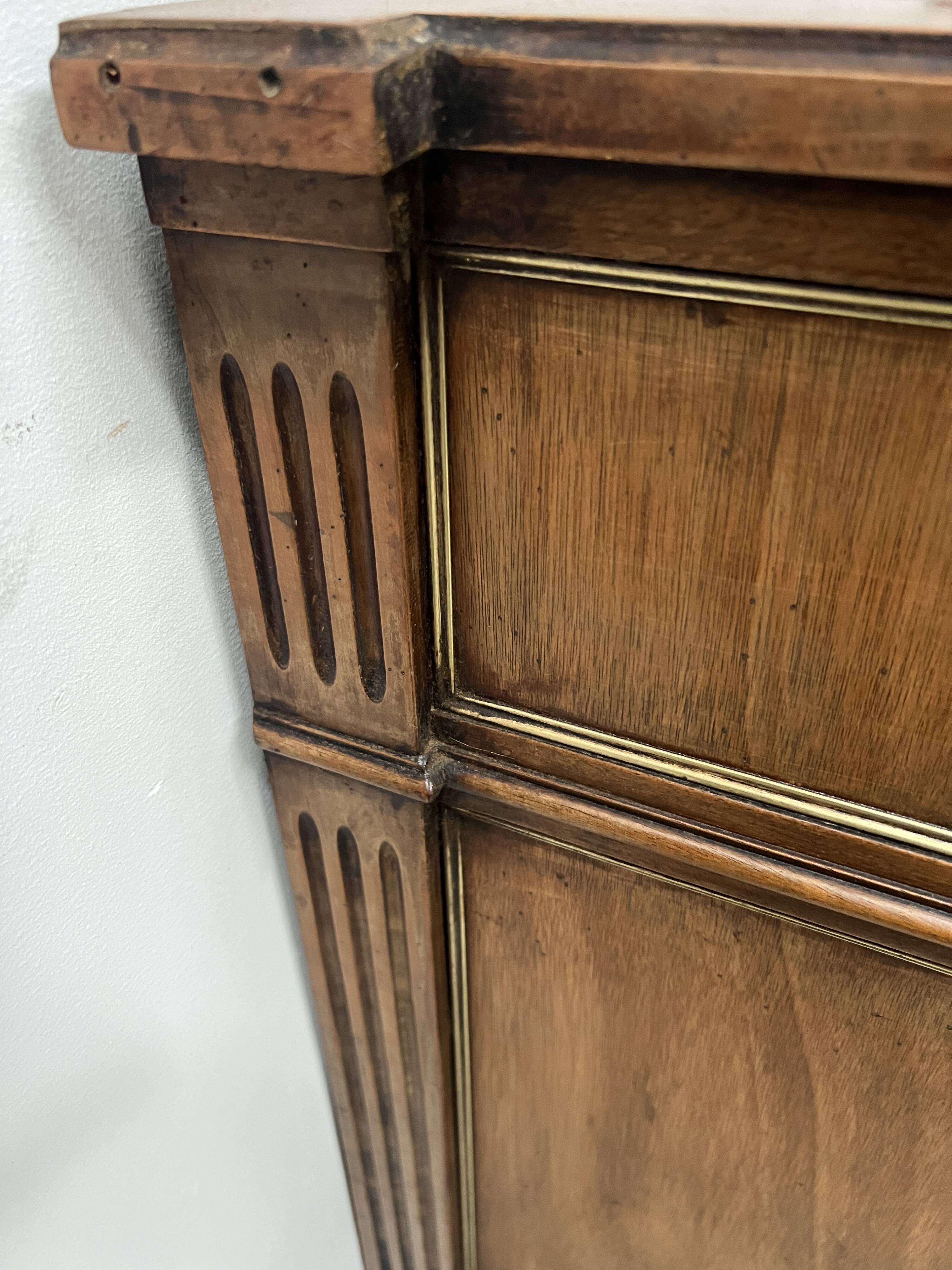 Louis XVI style mahogany commode with a grey veined marble top, 19th century