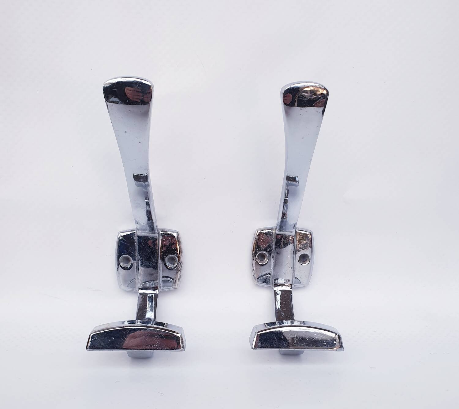 Pair of vintage chrome metal wall hooks
