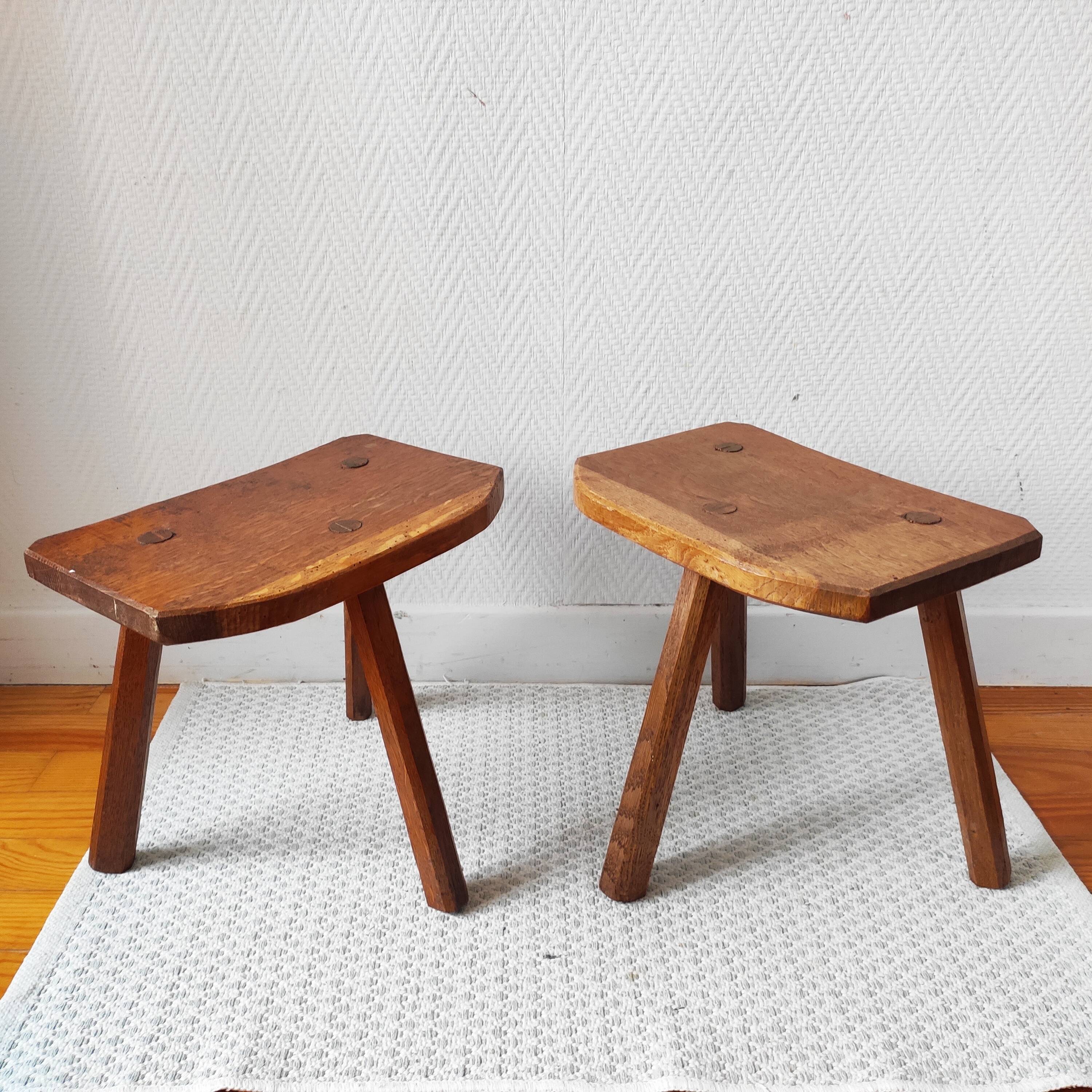 Pair of brutalist tripod stools in solid wood.