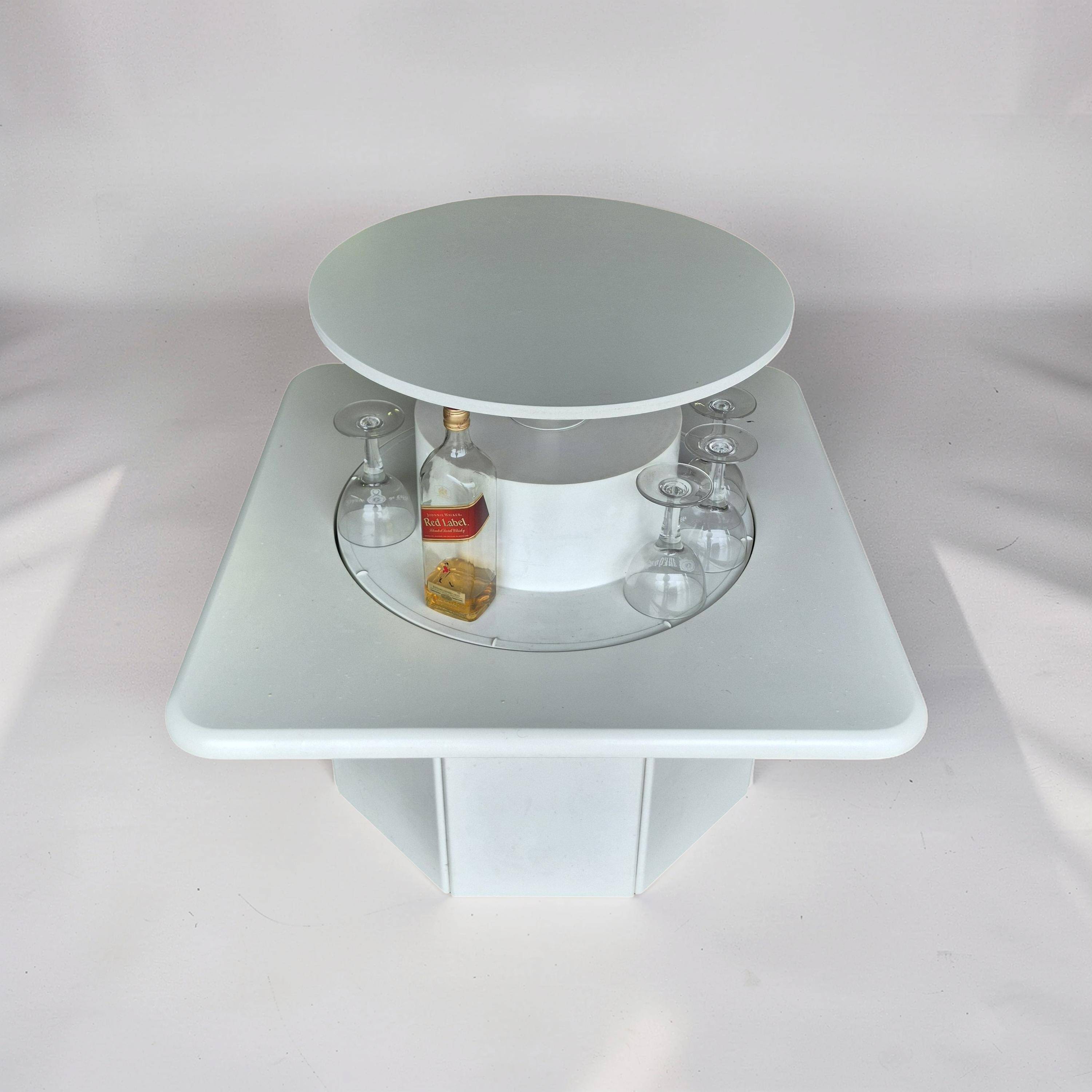 Post modern coffee table with a hidden rotating bar, Germany 1980s