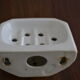 White ceramic wall soap holder
