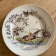 Polychrome ironstone dessert plates from Digoin and Sarreguemines.
