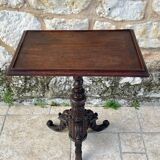 Tripod pedestal table in solid oak, richly carved and molded, 19th century