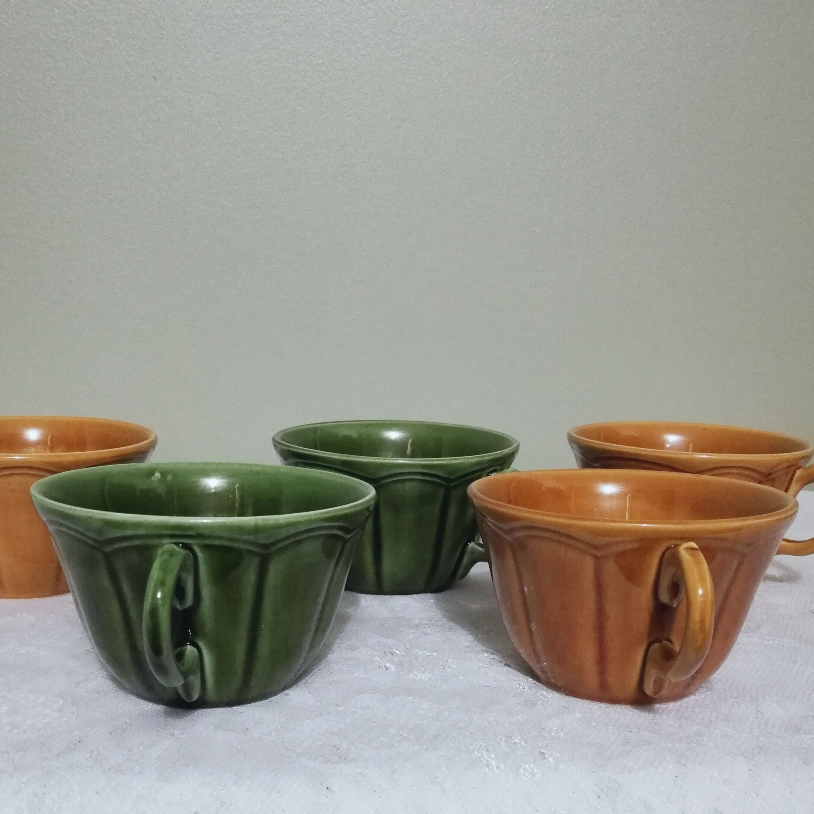 5 coffee or tea cups signed Longchamp