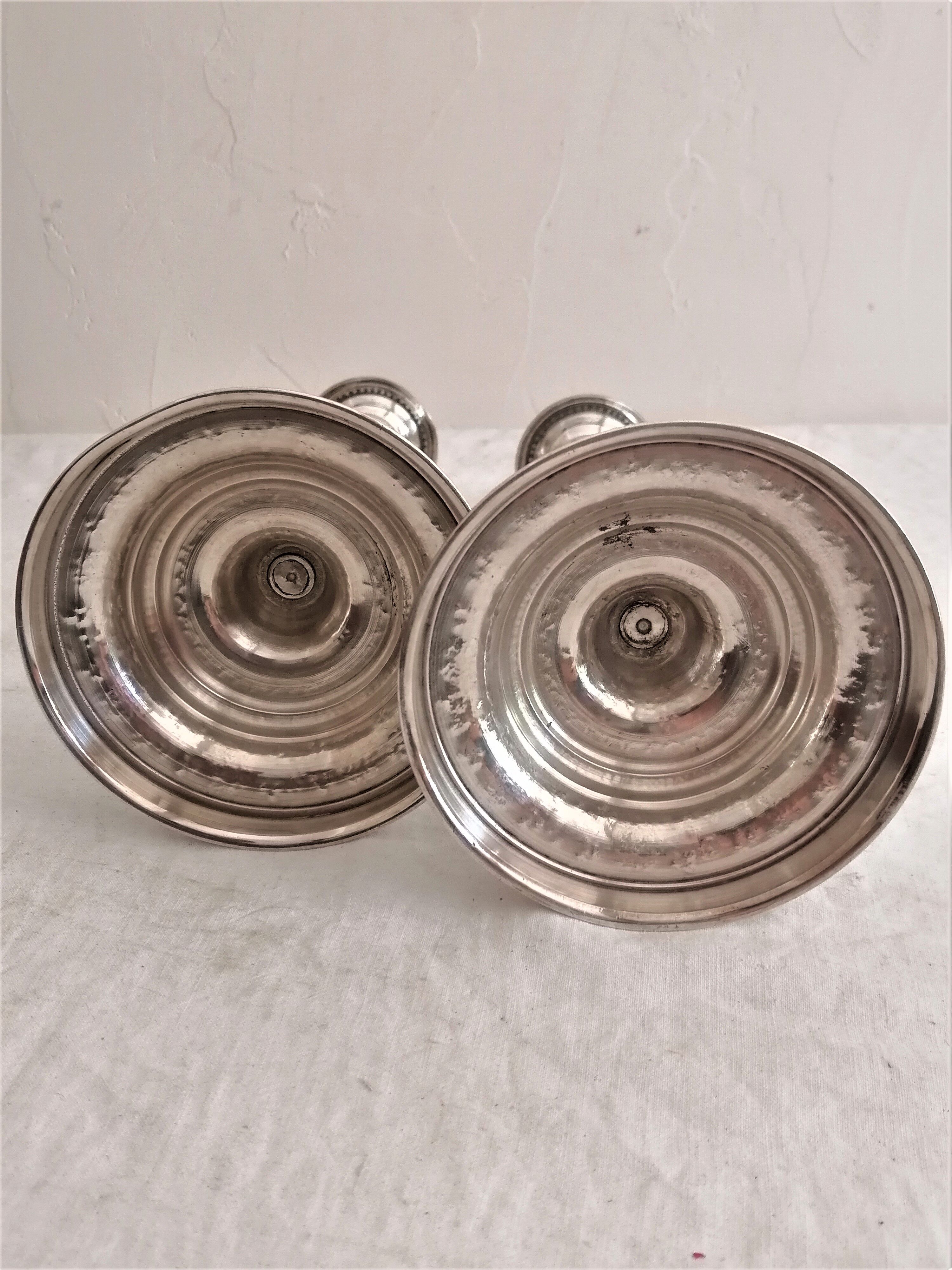Pair of silver bronze torches, XIXth